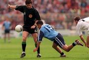 7th, June 1998. Referee Brian White watches over the action with Jason Sherlock, Dublin and Kildare's Anthony Rainbow.    Bank of Ireland Leinster Football Championship, Dublin v Kildare, Croke Park.  Picture Credit David Maher/SPORTSFILE.