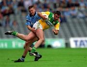 17 June 2001; Sean Grennan of Offaly in action against Darren Homan of Dublin during the Bank of Ireland Leinster Senior Football Championship Semi-Final match between Dublin and Offaly at Croke Park in Dublin. Photo by Ray McManus/Sportsfile