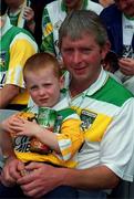 17 June 2001; Kieran McManus, age 4, from Rhode, Offaly, with his father Pat, ahead of the Bank of Ireland Leinster Senior Football Championship Semi-Final match between Dublin and Offaly at Croke Park in Dublin. Photo by Ray McManus/Sportsfile