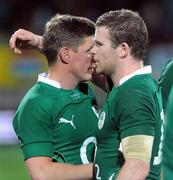 12 June 2010; Ireland's Ronan O'Gara, left, and Gordon D'Arcy hug after their 66-28 loss to New Zealand. Summer Tour 2010, New Zealand v Ireland, Yarrow Stadium, New Plymouth, Taranaki, New Zealand. Picture credit: Ross Setford / SPORTSFILE