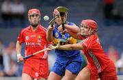 12 June 2010; Cora Hennessy, Tipperary, contests possession with Anna Geary, Cork. Gala All-Ireland Senior Camogie Championship, Tipperary v Cork, Semple Stadium, Thurles, Co. Tipperary. Picture credit: Brendan Moran / SPORTSFILE