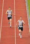 12 June 2010; Brothers David, right, 1st place, and Kieran Gallagher, 2nd place, from Inver, Co. Donegal, in action during the the 400m Run, division 126, during the 2010 Special Olympics Ireland Games. University of Limerick, Limerick. Picture credit: Diarmuid Greene / SPORTSFILE