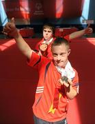 12 June 2010; Munster Region athletes Alan Quinlan, from Cappamore, Limerick, and Eoin Hanly, from Tipperary, show off their medal haul following the Gymnastics medal presentation during the third day of the 2010 Special Olympics Ireland Games. University of Limerick, Limerick. Picture credit: Stephen McCarthy / SPORTSFILE