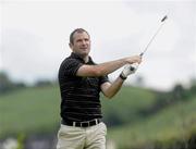 11 June 2010; Steven McDonnell, from Killeavy GAA club, watches his shot from the 14 tee. FBD All-Ireland GAA Golf Challenge 2010 - Ulster Final, Concra Wood Golf & Country Club, Castleblayney, Co. Monaghan. Picture credit: Oliver McVeigh / SPORTSFILE