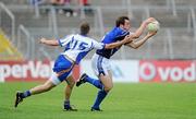 26 June 2010; John McCutcheon, Cavan, in action against Paul Earls, Wicklow. GAA Football All-Ireland Senior Championship Qualifier Round 1, Cavan v Wicklow, Kingspan Breffni Park, Cavan. Picture credit: Oliver McVeigh / SPORTSFILE