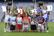 5 July 2010; 2010 marks the 10 year milestone of TG4’s sponsorship of the Ladies Football All Ireland Championships and the tenth year of the Ladies Football finals being televised by the national Irish language broadcaster. TG4 who became the title sponsors of the Ladies Football Championships in 2000 will broadcast 15 live championship games over the course of the summer. At the launch of the 2010 TG4 Ladies Football Championships at Croke Park are senior players, back row, from left, Aisling Holton, Kildare, Mags O'Donoghue, Kerry, Michaela Downey, Down, Edel McManus, Leitrim, Philomena Sheridan, Meath, Mairead Morrissey, Tipperary, and Yvonne Connell, Monaghan, with, front row, from left, Denise Masterson, Dublin, Sinead McLaughlin, Tyrone, Geraldine O'Flynn, Cork, Jackie Mulligan, Sligo, and Emer Flaherty, Galway. Croke Park, Dublin. Picture credit: Brendan Moran / SPORTSFILE