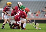 5 July 2010; Josh Murphy, Monageer-Boollavogue GAA Club, under pressure from St Patrick's, Ballyragget, Kilkenny, players, Kieran Walshe, 8, Lauren Phelan, left, and Mollie Southgate, during the ‘Play & Stay with the GAA’ Activity Days. Croke Park, Dublin. Picture credit: Ray McManus / SPORTSFILE