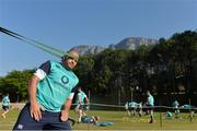 7 June 2016; Ireland captain Rory Best does some warm-up exercises in front of a backdrop of Table Mountain during squad training in Westerford High School, Cape Town, South Africa. Photo by Brendan Moran/Sportsfile