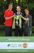 8 July 2010; Manchester United and Republic of Ireland International John O'Shea with St. Patrick's Athletic's Ryan Guy and Airtricity Supply Managing Director Kevin Greenhorn pictured at the ticket launch for the Airtricity Challenge on Wednesday August 4th when a representative Airtricity League XI takes on Manchester United at the Aviva Stadium. The Airtricity Challenge will be the first historic match in the new stadium. Portmarnock Hotel and Golf Links, Portmarnock, Co. Dublin. Picture credit: David Maher / SPORTSFILE