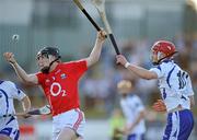 7 July 2010; Nicky Kelly, Cork, in action against Paudric Mahoney, Waterford. ESB Munster GAA Hurling Minor Championship Semi-Final Replay, Waterford v Cork, Walsh Park, Waterford. Picture credit: Matt Browne / SPORTSFILE