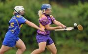 10 July 2010; Katriona Parrock, Wexford, in action against Mary Ryan, Tipperary. Gala All-Ireland Senior Camogie Championship, Tipperary v Wexford, The Ragg GAA Grounds, Thurles, Co. Tipperary. Picture credit: Brian Lawless / SPORTSFILE