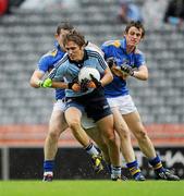 10 July 2010; Michael Fitzsimons, Dublin, in action against Barry Grogan and Conor Sweeney, Tipperary. GAA Football All-Ireland Senior Championship Qualifier, Round 2, Dublin v Tipperary, Croke Park, Dublin. Picture credit: Ray McManus / SPORTSFILE