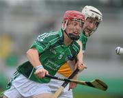 10 July 2010; Thomas O'Brien, Limerick, in action against Dylan Hayden, Offaly. GAA Hurling All-Ireland Senior Championship, Phase 2, Offaly v Limerick, O'Connor Park, Tullamore, Co. Offaly. Picture credit: David Maher / SPORTSFILE