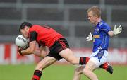 10 July 2010; Martin Clarke, Down, in action against Declan Reilly, Longford. GAA Football All-Ireland Senior Championship Qualifier, Round 2, Down v Longford, Pairc Esler, Newry, Co. Down. Picture credit: Oliver McVeigh / SPORTSFILE