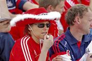 11 July 2010; A Cork supporter refreshes her lipstick before the game. Munster GAA Hurling Senior Championship Final, Cork v Waterford, Semple Stadium, Thurles, Co. Tipperary. Picture credit: Ray McManus / SPORTSFILE