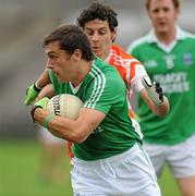 11 July 2010; Ryan McCluskey, Fermanagh, in action against Jamie Clarke, Armagh. GAA Football All-Ireland Senior Championship Qualifier Round 2, Fermanagh v Armagh, Brewster Park, Enniskillen, Co. Fermanagh. Picture credit: Oliver McVeigh / SPORTSFILE
