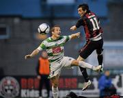 13 July 2010; Killian Brennan, Bohemians, beats Chris Marriot, The New Saints FC, to score his side's first goal. UEFA Champions League Second Qualifying Round - 1st Leg, Bohemians v The New Saints FC, Dalymount Park, Dublin. Picture credit: David Maher / SPORTSFILE