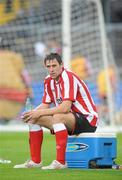 13 July 2010; Sunderland's Daryl Murphy relaxes on a cooler box after warming down with team-mates at half-time. Friendly in Aid of Shane Geoghegan Trust, Munster XI v Sunderland AFC, Thomond Park, Limerick. Picture credit: Diarmuid Greene / SPORTSFILE