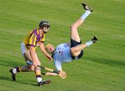 14 July 2010; Eoin Moore, Wexford, in action against Martin Quilty, Dublin. Bord Gáis Energy GAA Hurling Under 21 Leinster Championship Final, Dublin v Wexford, Parnell Park, Dublin. Picture credit: Stephen McCarthy / SPORTSFILE