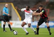 16 July 2010; Joseph Ndo, Sligo Rovers, in action against Ken Oman, Bohemians. Airtricity League Premier Division, Bohemians v Sligo Rovers, Dalymount Park, Dublin. Picture credit: David Maher / SPORTSFILE