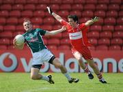 17 July 2010; Alan Smith, Kildare, in action against Dermot McBride, Derry. GAA Football All-Ireland Senior Championship Qualifier Round 3, Derry v Kildare, Celtic Park, Derry. Picture credit: Oliver McVeigh / SPORTSFILE