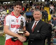 18 July 2010; Harry Og Conlon, Tyrone, who was presented with the ESB Ulster GAA Football Minor Championship Final Man of the Match award by James McHugh of ESB. ESB Ulster GAA Football Minor Championship Final, Tyrone v Armagh, Croke Park, Dublin. Picture credit: Brendan Moran / SPORTSFILE