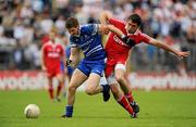 18 July 2010; Darren Hughes, Monaghan, holds off the challenge of Joe McMahon, Tyrone. Ulster GAA Football Senior Championship Final, Monaghan v Tyrone, St Tighearnach's Park, Clones, Co. Monaghan. Picture credit: Brendan Moran / SPORTSFILE