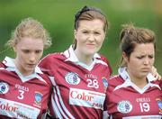 24 July 2010; Westmeath players, from left, Aoife Brady, captain, Ruth Daniels, and Jill Draper, show their disappointment after the match. Ladies Gaelic Football Minor A Shield All-Ireland Final, Mayo v Westmeath, Seán O'Heslin GAA Cub, Ballinamore, Co. Leitrim. Picture credit: Brian Lawless / SPORTSFILE