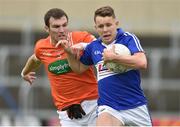 18 June 2016; Stephen Attride of Laois in action against Brendan Donaghy of Armagh during the GAA Football All-Ireland Senior Championship Qualifier Round 1A match between Laois and Armagh at O'Moore Park in Portlaoise, Co. Laois. Photo by Matt Browne/Sportsfile