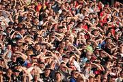 24 July 2010; Supporters of Sligo and Down watch the game as the strong sun sets. GAA Football All-Ireland Senior Championship Qualifier, Round 4, Sligo v Down, Kingspan Breffni Park, Cavan. Picture credit: Ray McManus / SPORTSFILE