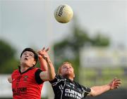 24 July 2010; Ross Donavan, Sligo, in action against Martin Clarke, Down. GAA Football All-Ireland Senior Championship Qualifier, Round 4, Sligo v Down, Kingspan Breffni Park, Cavan. Picture credit: Ray McManus / SPORTSFILE