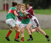 24 July 2010; Kelly Boyce Jordan, Westmeath, in action against Carol Hegarty and Ciara McManamon, left, Mayo. Ladies Gaelic Football Minor A Shield All-Ireland Final, Mayo v Westmeath, Seán O'Heslin GAA Cub, Ballinamore, Co. Leitrim. Picture credit: Brian Lawless / SPORTSFILE