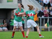 24 July 2010; Mayo captain Carol Hegarty, right, celebrates with team-mate Avril Kilkelly, after scoring her side's third goal. Ladies Gaelic Football Minor A Shield All-Ireland Final, Mayo v Westmeath, Seán O'Heslin GAA Cub, Ballinamore, Co. Leitrim. Picture credit: Brian Lawless / SPORTSFILE