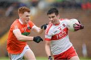 19 June 2016; Conor Doherty of Derry in action against Jason Duffy of Derry during the Electric Ireland Ulster GAA Football Minor Championship Semi-Final match between Armagh and Derry at St Tiernach's Park in Clones, Co Monaghan. Photo by Oliver McVeigh/Sportsfile