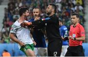 22 June 2016; Shane Long of Republic of Ireland taunts Leonardo Bonucci and Salvatore Sirigu of Italy during the UEFA Euro 2016 Group E match between Italy and Republic of Ireland at Stade Pierre-Mauroy in Lille, France. Photo by David Maher / Sportsfile