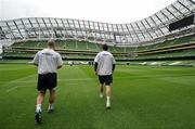 3 August 2010; Paul Keegan, left, and Ken Oman, both Bohemians, walk out onto the pitch before the start of squad training ahead of the Airtricity Challenge match between Airtricity League XI and Manchester United on Wednesday 4th August. Squad Training ahead of Airtricity Challenge, Aviva Stadium, Lansdowne Road, Dublin. Picture credit: David Maher / SPORTSFILE