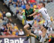 1 August 2010; Alan Smith, Kildare, fists the ball past Kevin Reill, Meath, to score his side's second goal. GAA Football All-Ireland Senior Championship Quarter-Final, Meath v Kildare, Croke Park, Dublin. Picture credit: Barry Cregg / SPORTSFILE