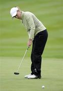 6 August 2010; Rebecca Coakley, Ireland, watches her putt on the 12th green. AIB Ladies Irish Open Golf Championship, Killeen Castle, Co. Meath. Picture credit: Matt Browne / SPORTSFILE