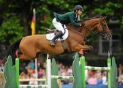 6 August 2010; Denis Lynch, competing on Nabab's Son, Ireland, during the Meydan FEI Nations Cup - Failte Ireland Dublin Horse Show 2010. RDS, Ballsbridge, Dublin. Picture credit: Stephen McCarthy / SPORTSFILE