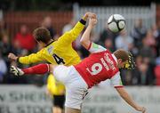 6 August 2010; Daniel North, St Patrick's Athletic, in action against Ciaran Hoey, Drogheda United. Airtricity League Premier Division, St Patrick's Athletic v Drogheda United, Richmond Park, Dublin. Picture credit: David Maher / SPORTSFILE