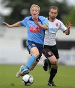 6 August 2010; Paul O'Connor, UCD, in action against Fahrudin Kuduzovic, Dundalk. Airtricity League Premier Division, Dundalk v UCD, Oriel Park, Dundalk, Co. Louth. Photo by Sportsfile