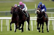 14 July 2001; Distant Music, with Richard Hughes up, lead from Bonnard, Mick Kinane, left, and Muakaad, with Pat Smullen up, right, on their way to winning The Goffs International Stakes at the Curragh Racecourse in Kildare. Photo by Damien Eagers/Sportsfile