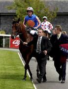 14 July 2001; Johannesburg, with Mick Kinane up, are led into the winners enclosure after winning the Anglesey Stakes at the Curragh Racecourse in Kildare. Photo by Damien Eagers/Sportsfile