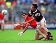 22 July 2001; Graham Canty of Cork in action against Padraig Joyce of Galway during the Bank of Ireland All-Ireland Senior Football Championship Qualifier Round 4 match between Galway and Cork at Croke Park in Dublin. Photo by Ray McManus/Sportsfile