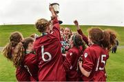 26 June 2016; Galway and District League players celebrate with the Jeremy Dee Cup after defeating Metropolitan Girls League in their FAI U16 Gaynor Cup Final at University of Limerick in Limerick. Photo by Diarmuid Greene/Sportsfile