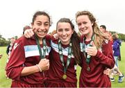 26 June 2016; Galway and District League players Lucia Lobato, left, Sadhbh Doyle, centre, and Heather Payne celebrate with their medals after defeating Metropolitan Girls League in their FAI U16 Gaynor Cup Final at University of Limerick in Limerick. Photo by Diarmuid Greene/Sportsfile