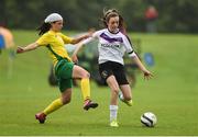 26 June 2016; Chloe Singleton of Midlands Schoolgirls League in action against Amy Boyle-Carr of Donegal Women's League during their FAI U16 Gaynor Cup Plate Final at University of Limerick in Limerick. Photo by Diarmuid Greene/Sportsfile