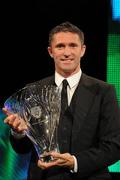 8 August 2010; Republic of Ireland captain Robbie Keane receives the Senior International Player of the Year award. 20th FAI International Football Awards, RTE studios, Donnybrook, Dublin. Picture credit: David Maher / SPORTSFILE