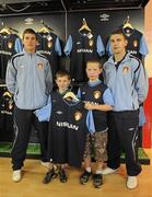 12 August 2010; St. Patrick's Athletic's Dave McAllister, left, and James O' Brien, alongside Jack Kelly, age 9, and Ciarán Anderson, age 10, both from Ballinteer, Co. Dublin, at the launch and opening of the club's shop ahead of their Airtricity League Premier Division match against Bray Wanderers on Friday. St Patrick's Athletic Press Conference, Richmond Park, Dublin. Picture credit: Barry Cregg / SPORTSFILE