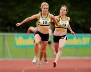 14 August 2010; Ailis McSweeney, Leevale AC, receives the baton from Sophie Heinsch during the Women's 4 x 100m Premier Division relay at the Woodie's DIY National League Final 2010. Tullamore Harriers Stadium, Tullamore, Co. Offaly. Picture credit: Barry Cregg / SPORTSFILE